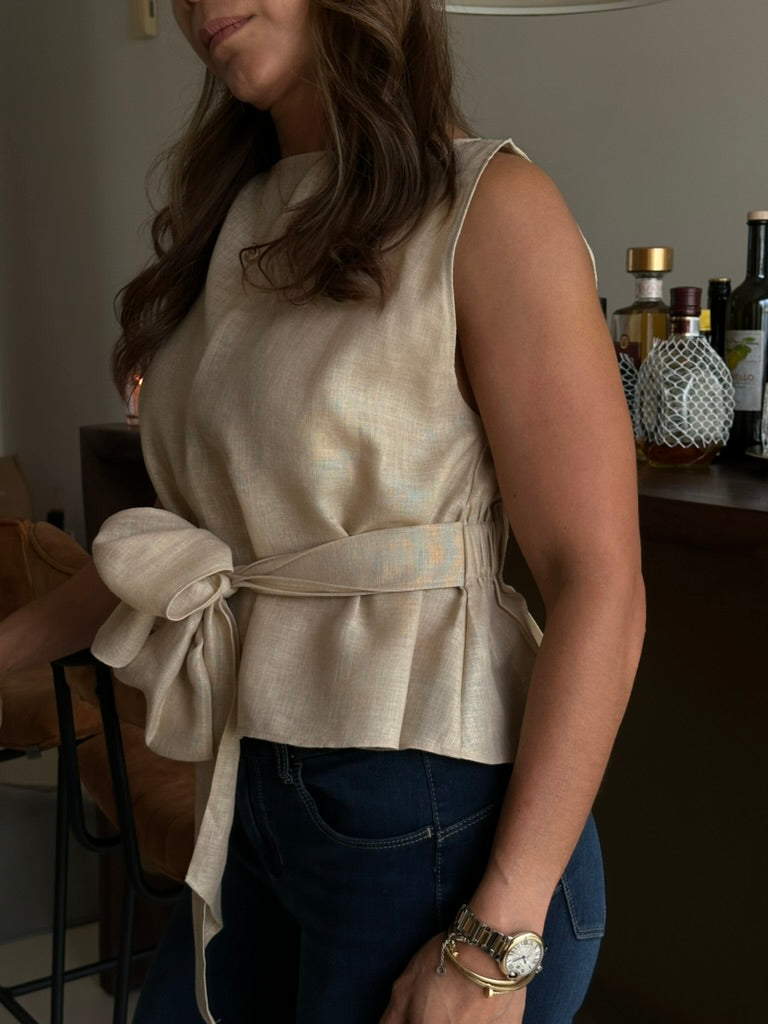 Handmade stitching and artisanal craftsmanship on Lazo Top, curated by Nathalia Ojeda
